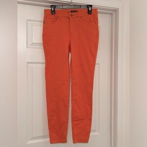 Salmon colored jeans